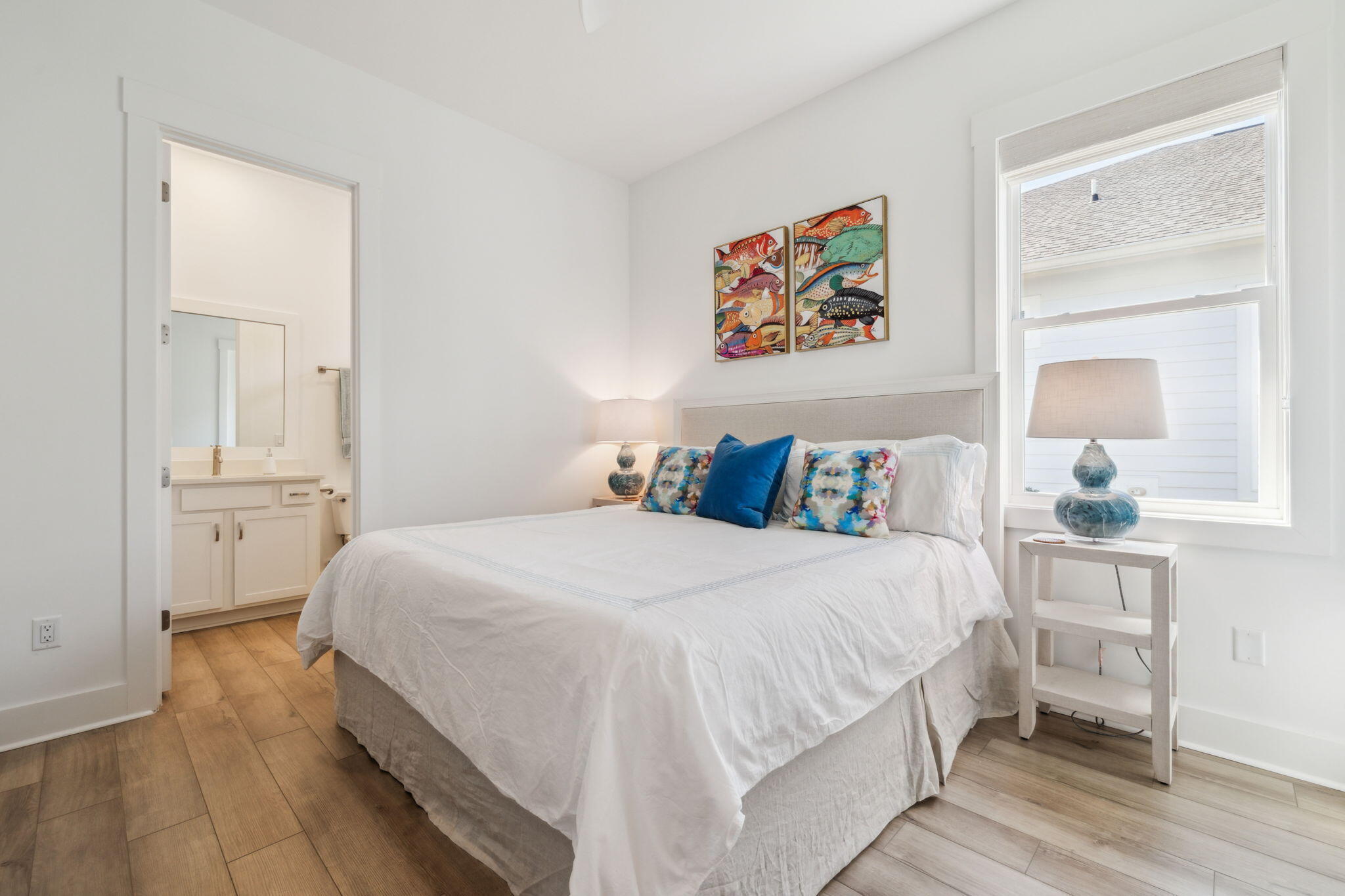 282 West Lafayette Rd Inlet Beach Inlet Beach, FL 32461 - Photo 25 of 40 a bedroom with bed and wooden floor