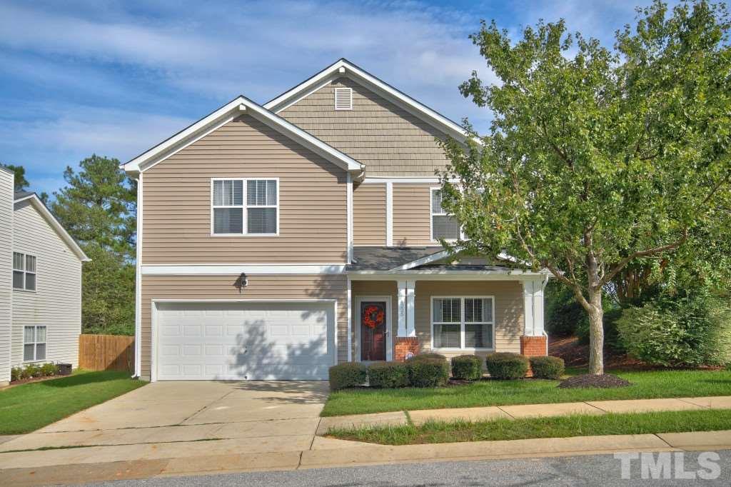 4225 Hopper Street Raleigh, NC 27616 - Photo 1 of 19 a front view of a house with a yard