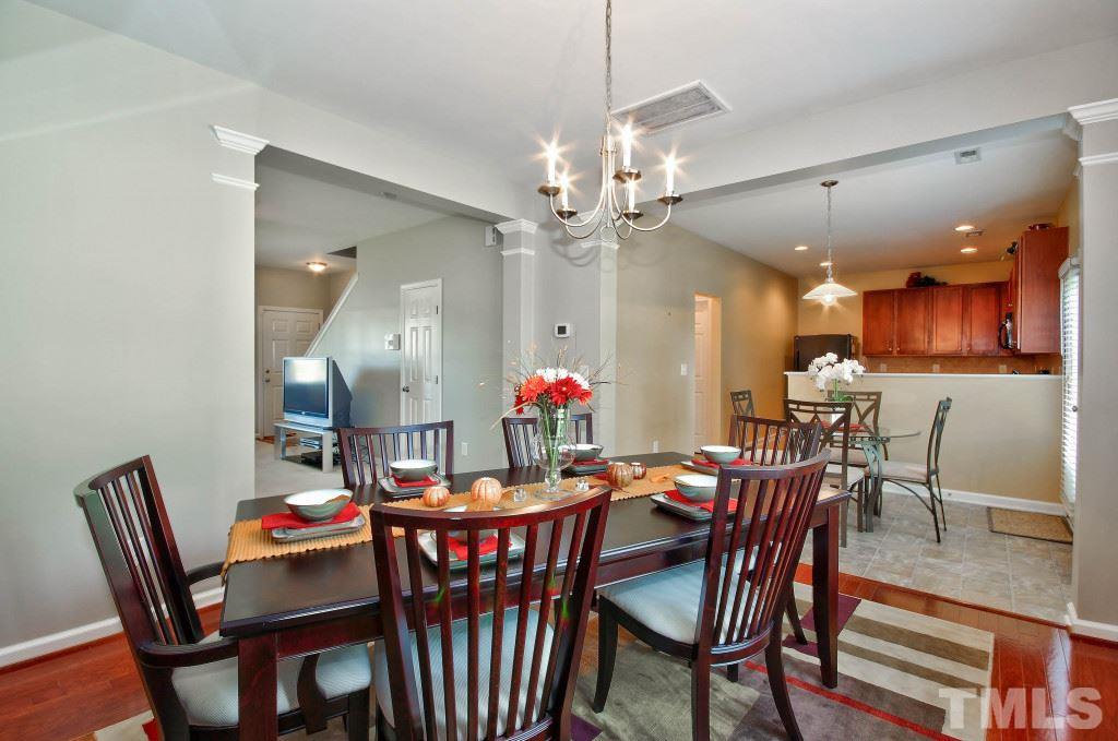 4225 Hopper Street Raleigh, NC 27616 - Photo 9 of 19 a view of a dining room and a livingroom