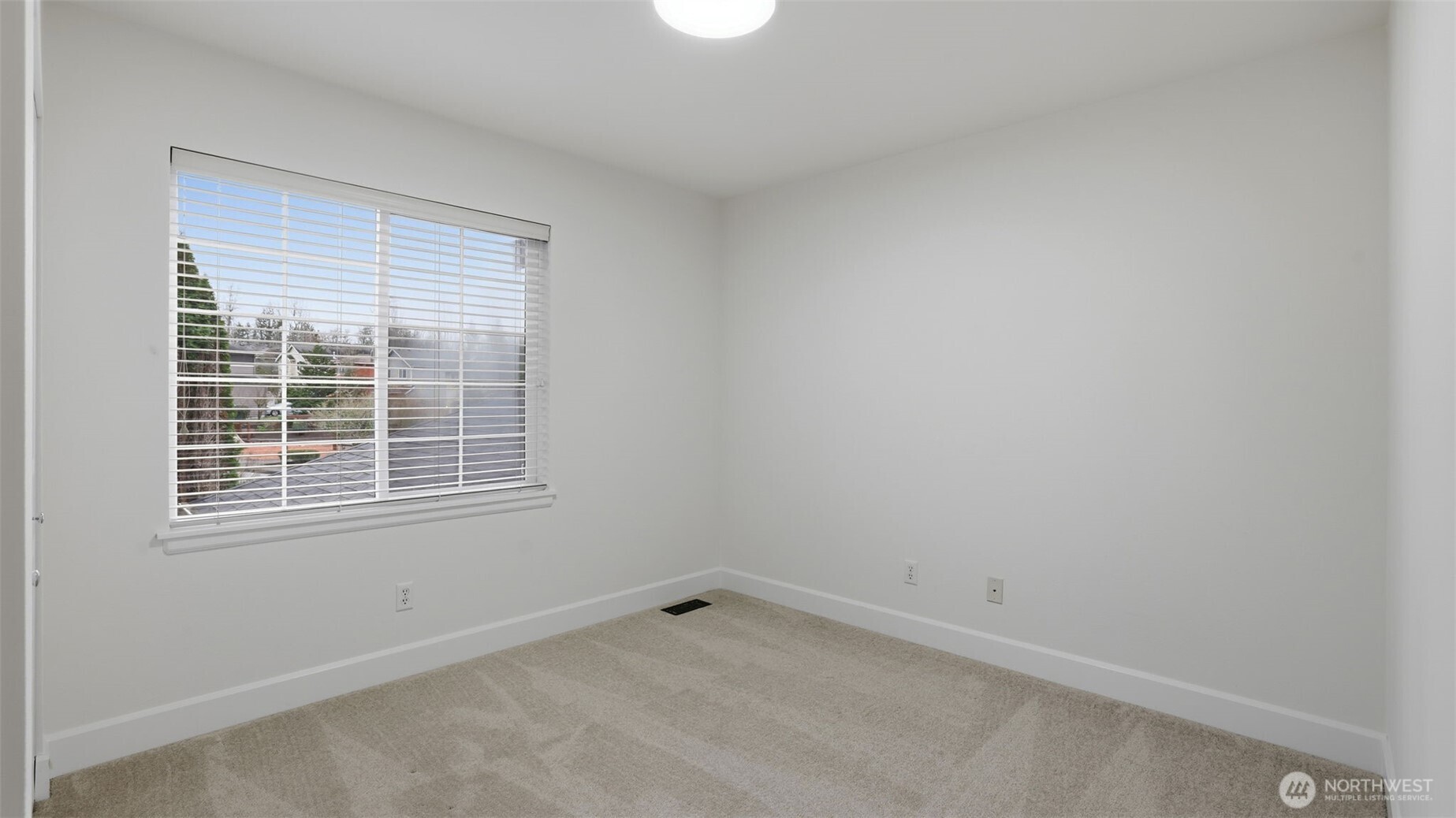 16102 Parkside Way Southeast Renton, WA 98058 - Photo 16 of 27 an empty room with a window