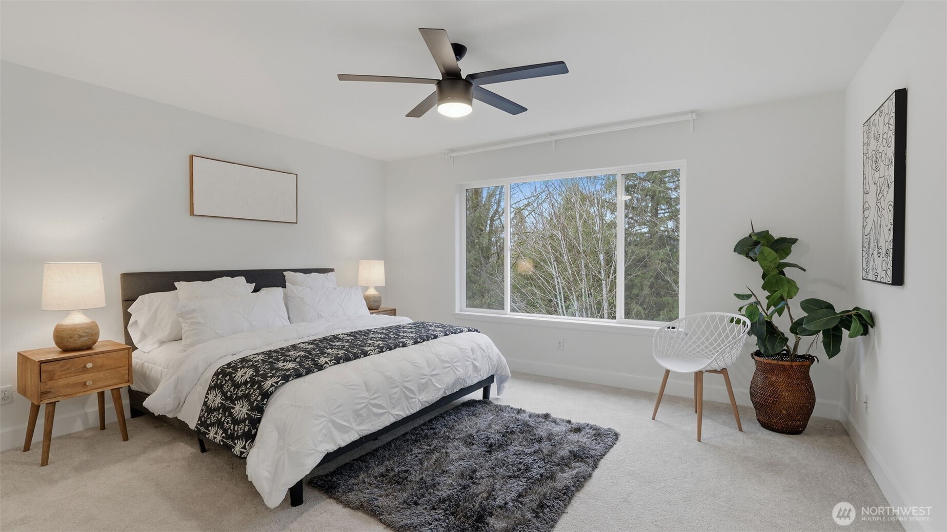 16102 Parkside Way Southeast Renton, WA 98058 - Photo 18 of 27 a bedroom with a bed potted plant and a window