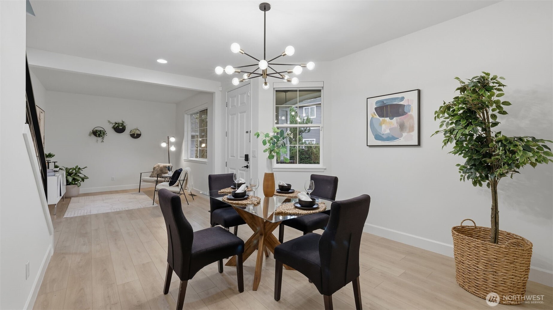 16102 Parkside Way Southeast Renton, WA 98058 - Photo 5 of 27 a view of a dining room with furniture and chandelier