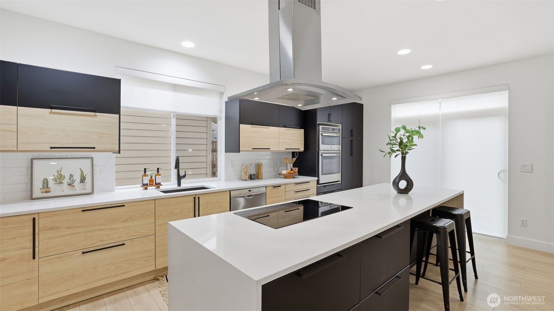 16102 Parkside Way Southeast Renton, WA 98058 - Photo 9 of 27 a kitchen with a sink a stove a refrigerator and cabinets
