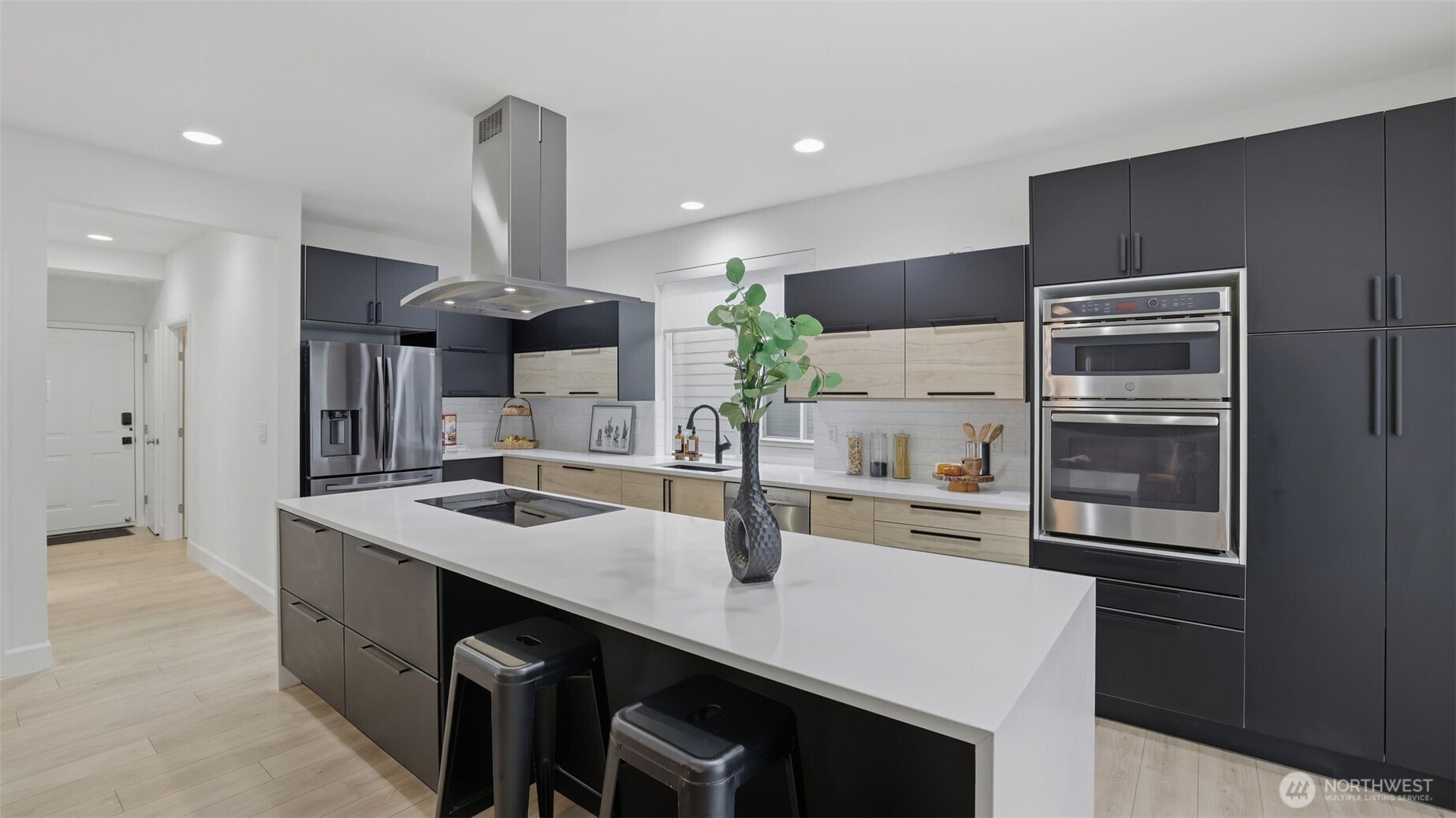 16102 Parkside Way Southeast Renton, WA 98058 - Photo 10 of 27 a kitchen with stainless steel appliances a sink and stove