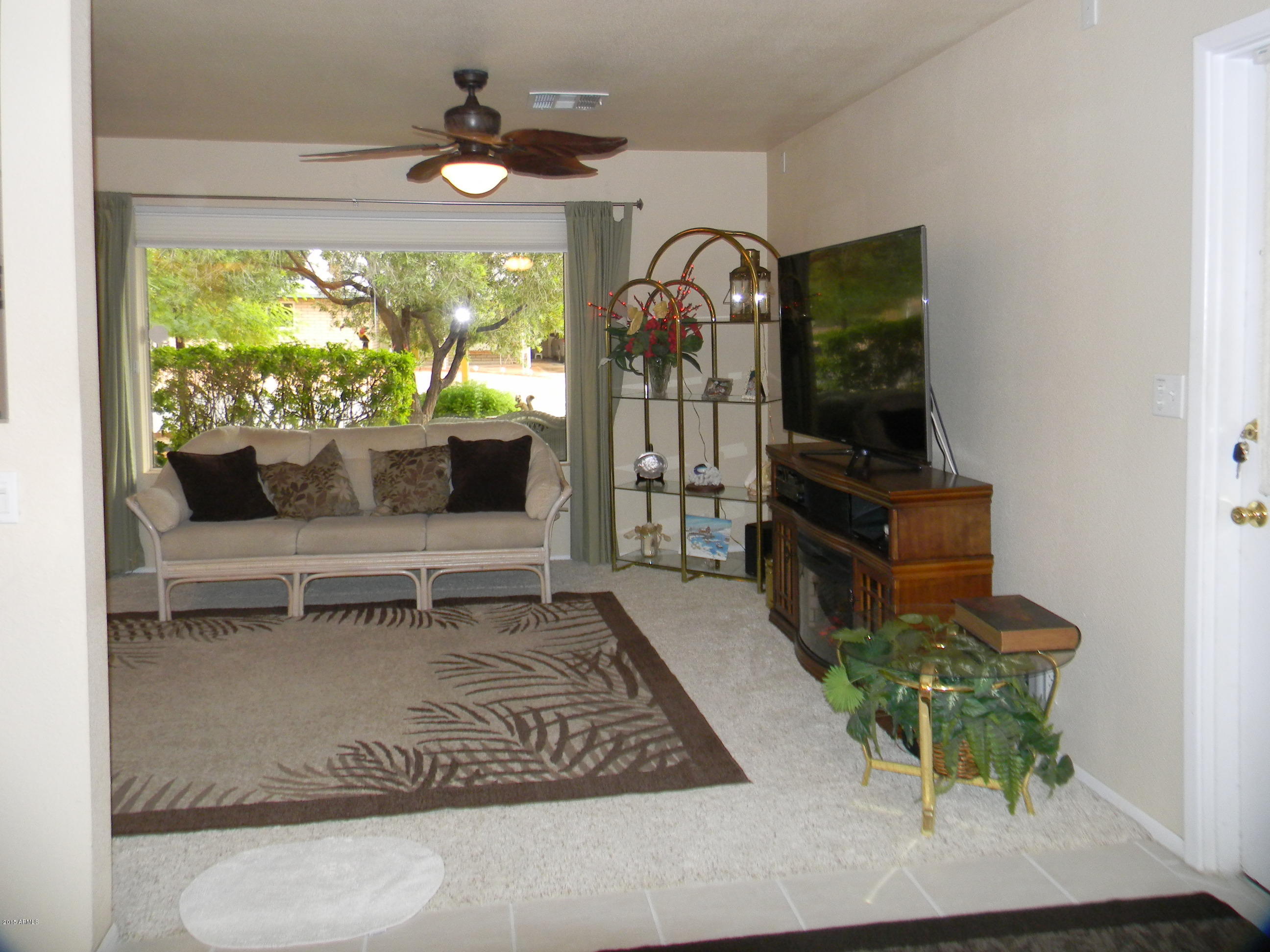 6264 East Decatur Street Mesa, AZ 85205 - Photo 2 of 12 6264Living Room from Breakfast Room