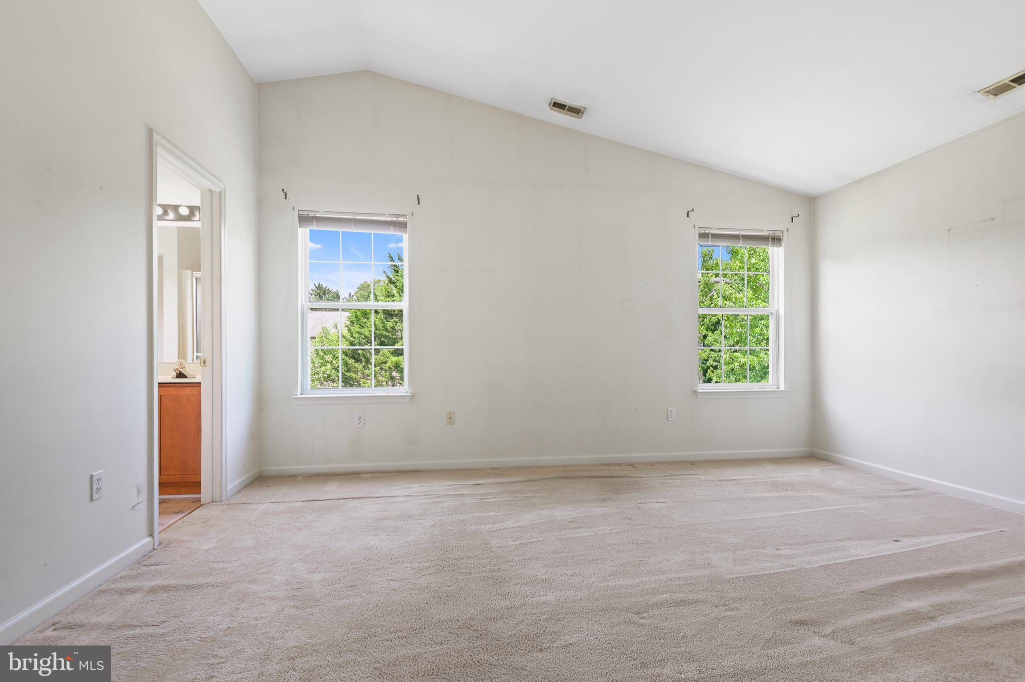 1318 Bay Ridge Avenue Annapolis, MD 21403 - Photo 18 of 41 Large Primary Bedroom with Vaulted Ceilings