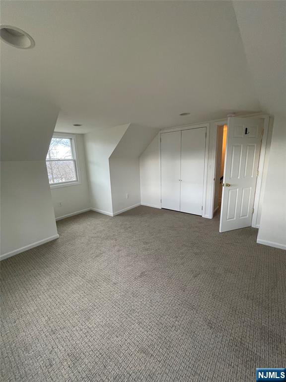 70 Suters Lane Wayne, NJ 07470 - Photo 16 of 22 an empty room with windows and fireplace