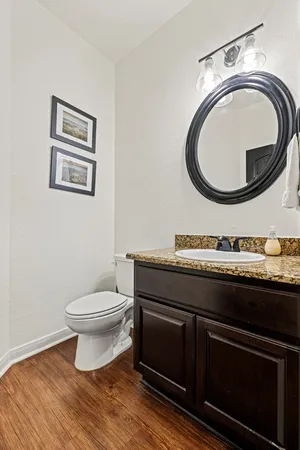a bathroom with a toilet and a sink
