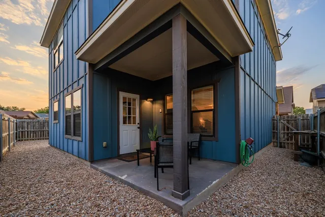 a view of a porch with furniture