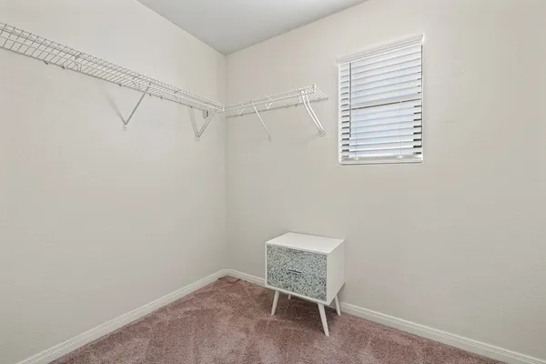 a view of a room with racks on the wall