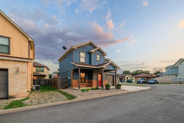 a view of street with parked cars
