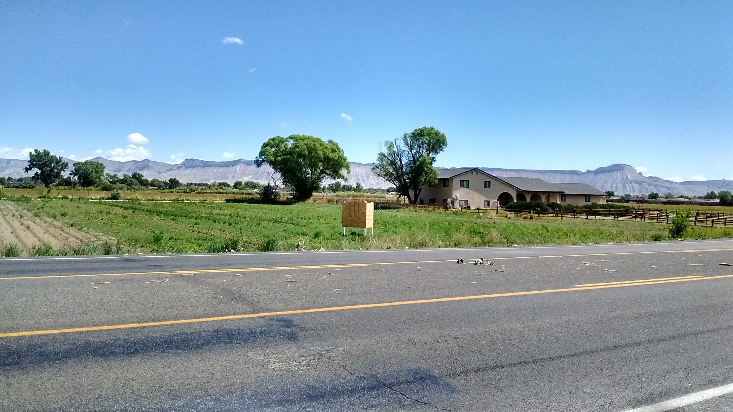 2910 D Road, Unit 3 2 AC Grand Junction, CO 81504 - Photo 11 of 11 a house with a yard