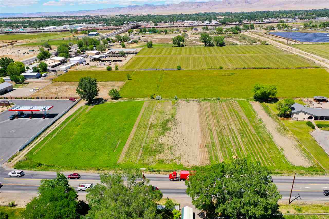 2910 D Road, Unit 3 2 AC Grand Junction, CO 81504 - Photo 8 of 11 an aerial view of a pool with lawn chairs