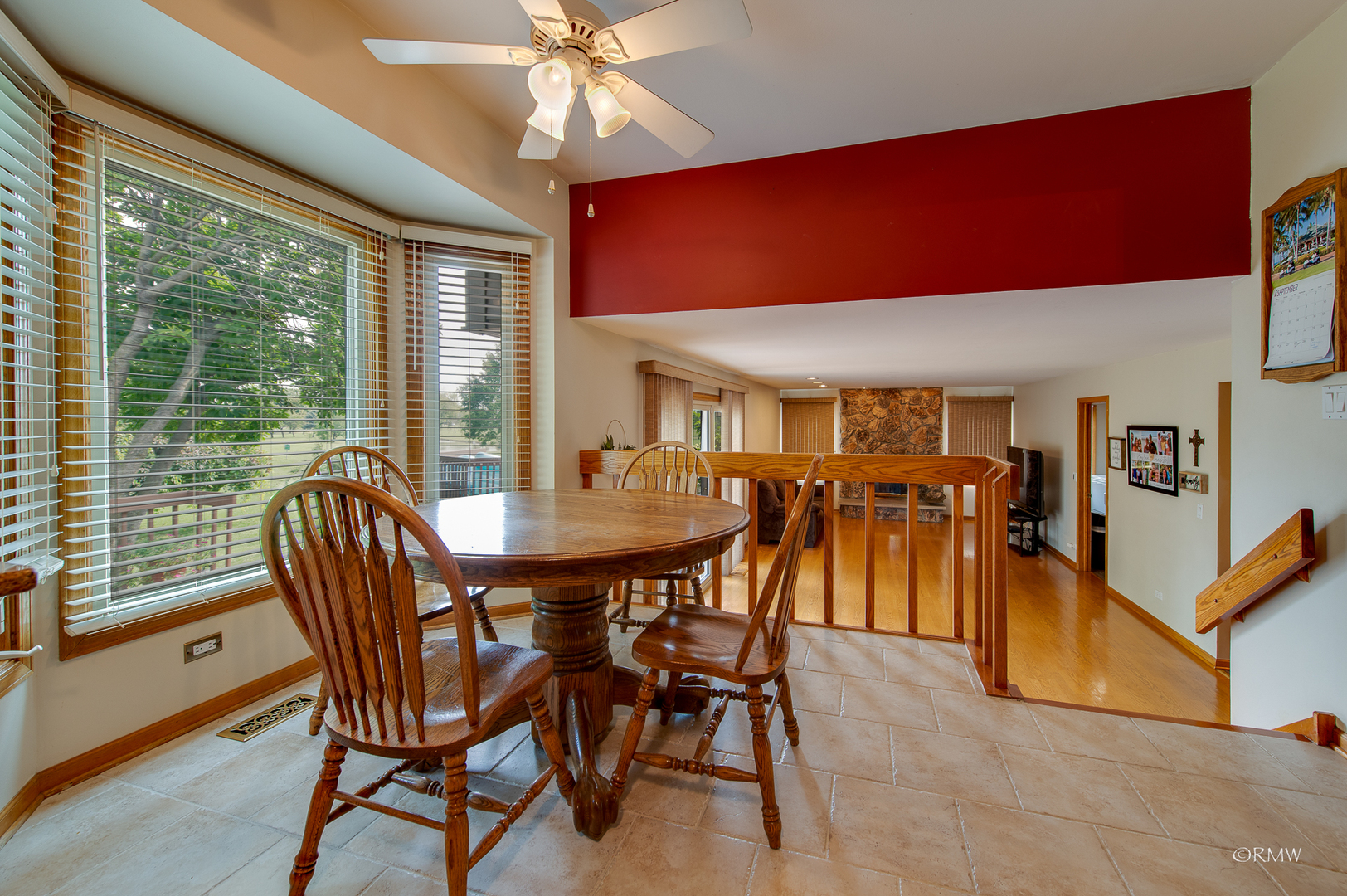 1550 Squire Lane Addison, IL 60101 - Photo 15 of 39 a view of a dining room with furniture window and outside view