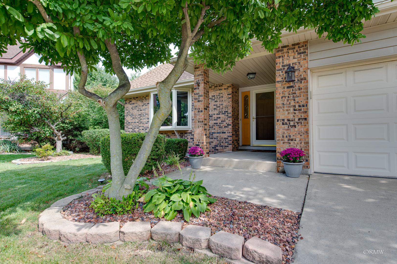 1550 Squire Lane Addison, IL 60101 - Photo 2 of 39 a view of a house with a small garden and plants