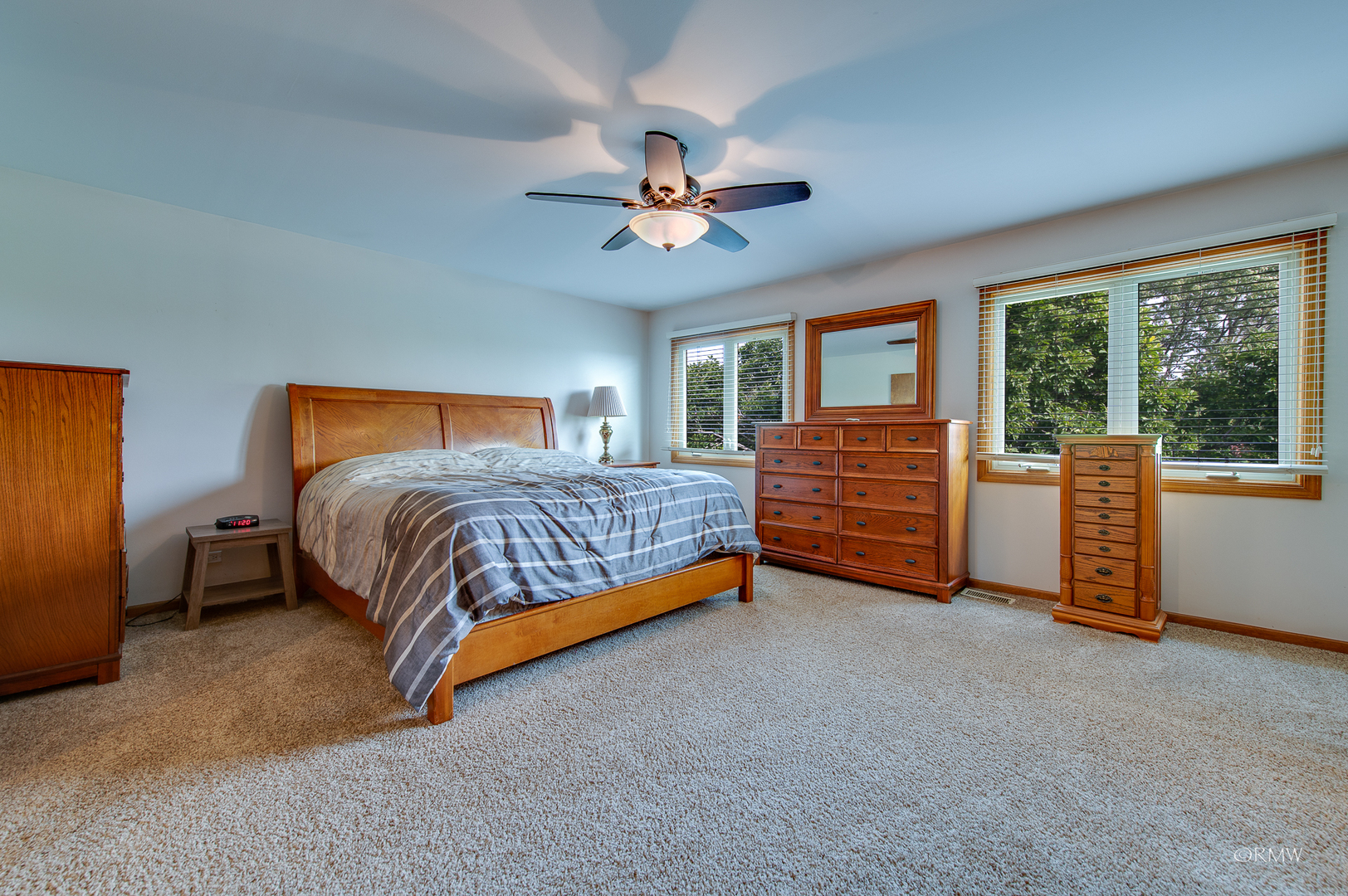 1550 Squire Lane Addison, IL 60101 - Photo 24 of 39 a bedroom with a bed and a ceiling fan