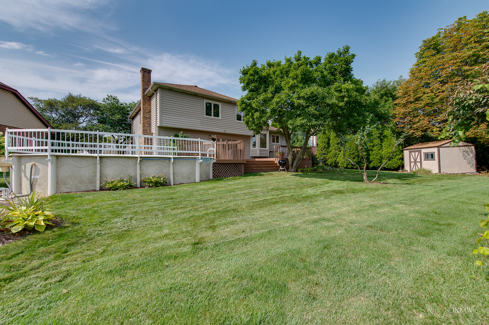 1550 Squire Lane Addison, IL 60101 - Photo 39 of 39 a view of a house with a yard and sitting area
