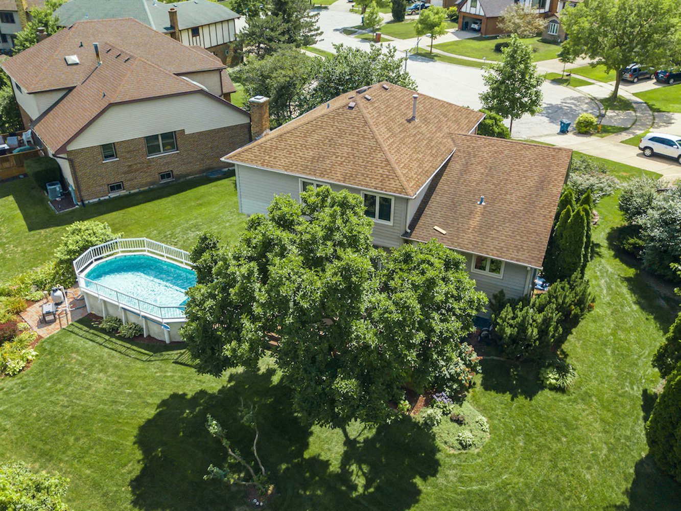 1550 Squire Lane Addison, IL 60101 - Photo 5 of 39 an aerial view of a house with yard swimming pool and outdoor seating