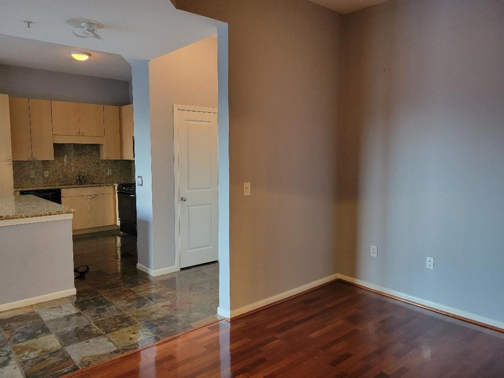 3505 Sage Road, Unit 211 Houston, TX 77056 - Photo 16 of 25 a view of a kitchen with a sink and a refrigerator