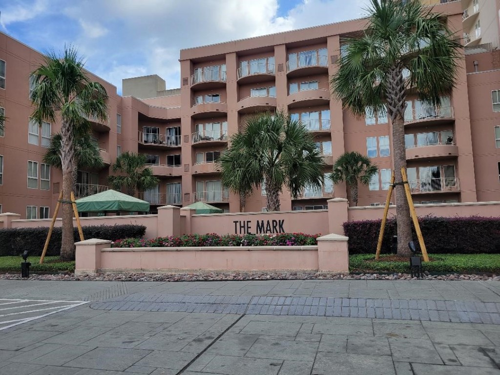 3505 Sage Road, Unit 211 Houston, TX 77056 - Photo 2 of 25 a front view of a building with garden