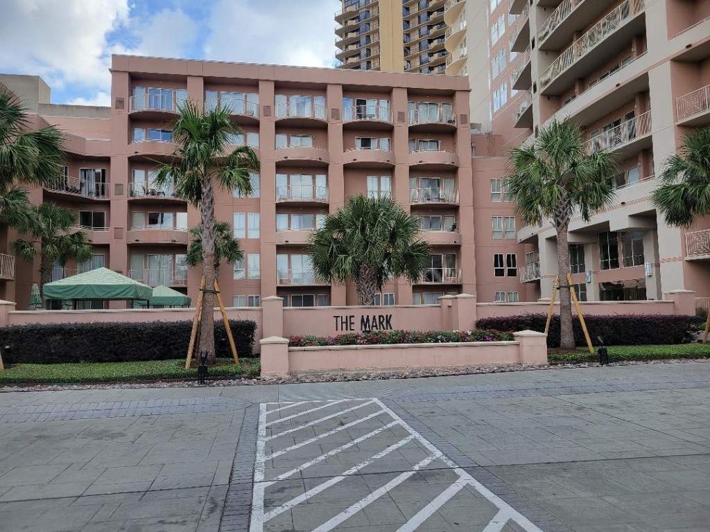 3505 Sage Road, Unit 211 Houston, TX 77056 - Photo 24 of 25 a front view of a building with street