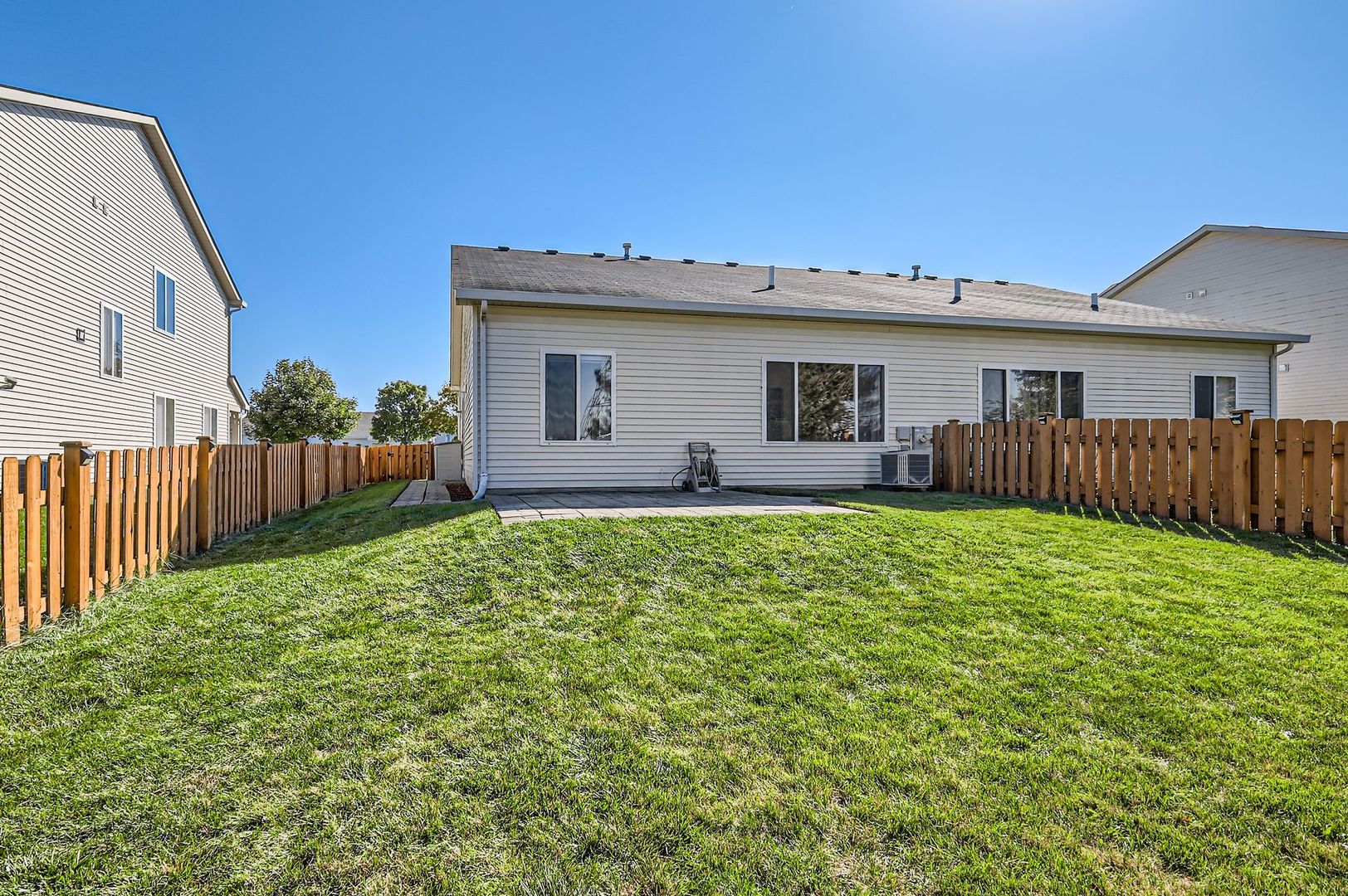 3019 Hoffman Street Plano, IL 60545 - Photo 10 of 10 a front view of house with yard and green space