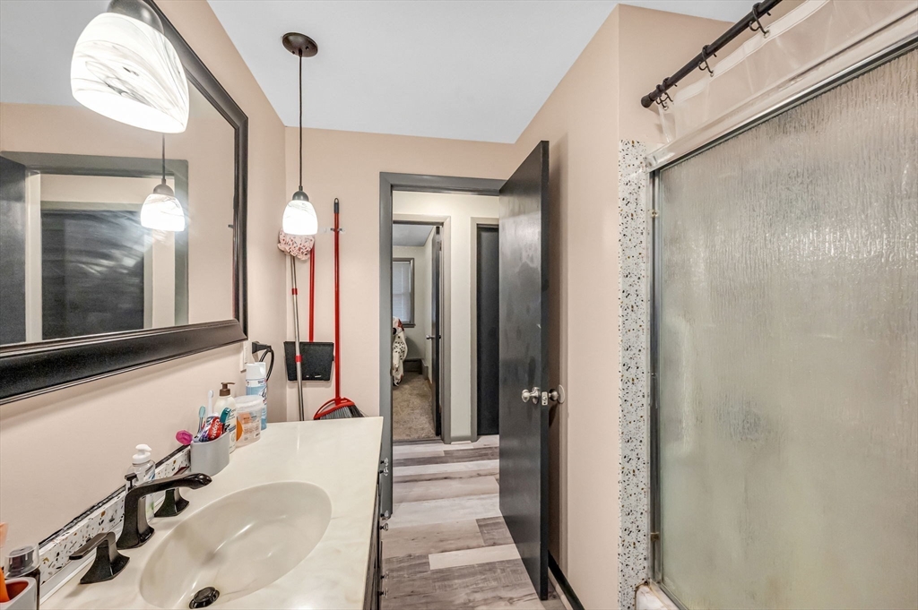 31 Stone Path Lane West Springfield, MA 01089 - Photo 18 of 31 a bathroom with a tub sink and mirror