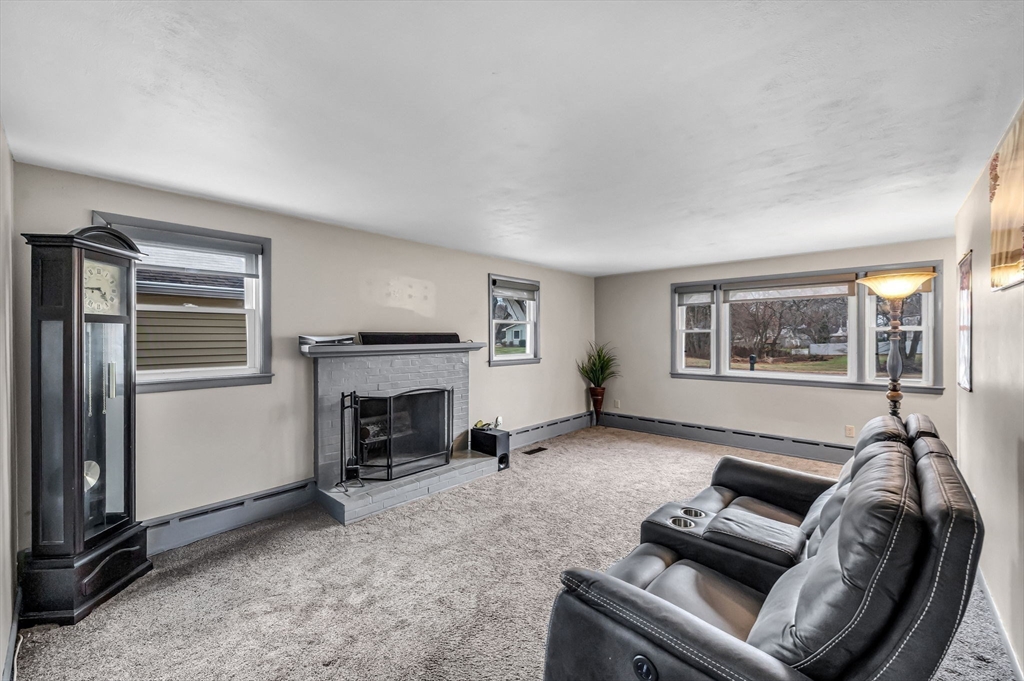 31 Stone Path Lane West Springfield, MA 01089 - Photo 6 of 31 a living room with furniture and a fireplace