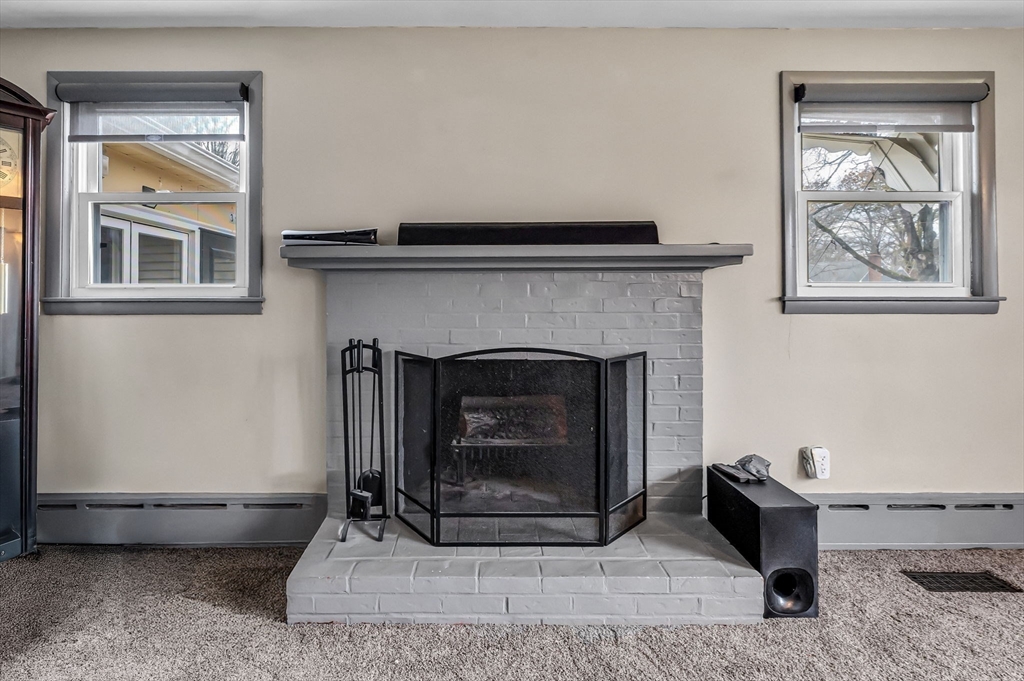 31 Stone Path Lane West Springfield, MA 01089 - Photo 9 of 31 a living room with furniture and a fireplace