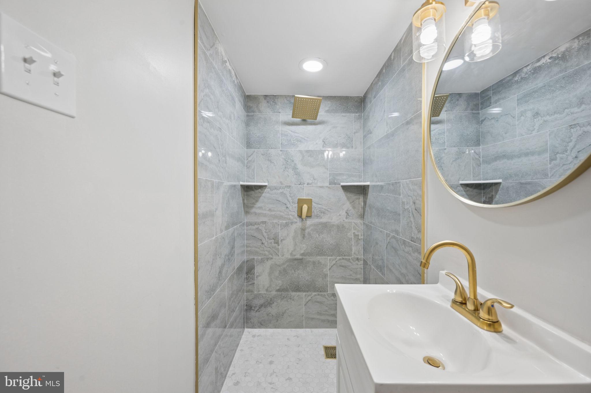1108 South Clinton Street Baltimore, MD 21224 - Photo 55 of 66 Elegant bathroom with modern finishes.