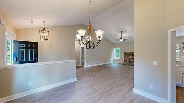 a kitchen with a sink stove and microwave