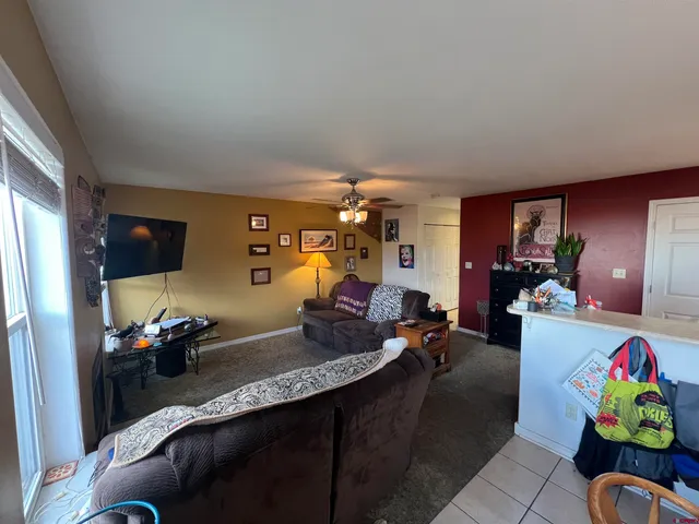 a living room with furniture and a couch