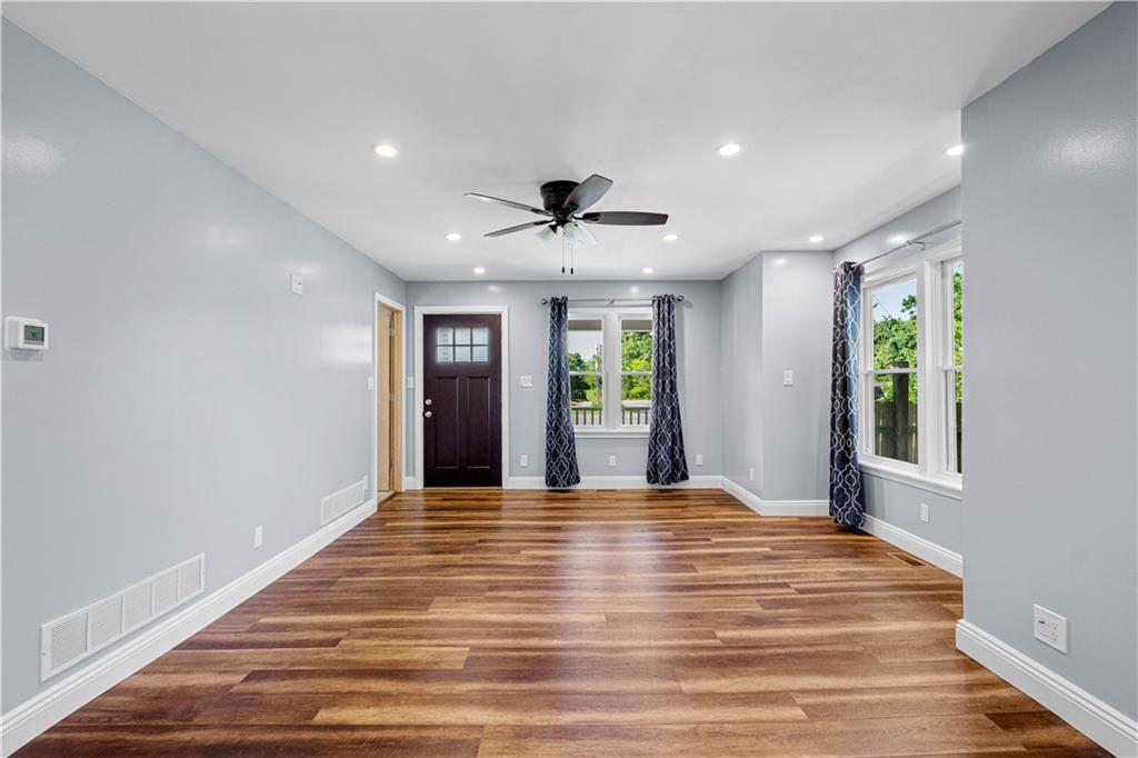 Large living area with LVP flooring.  New windows and doors throughout.