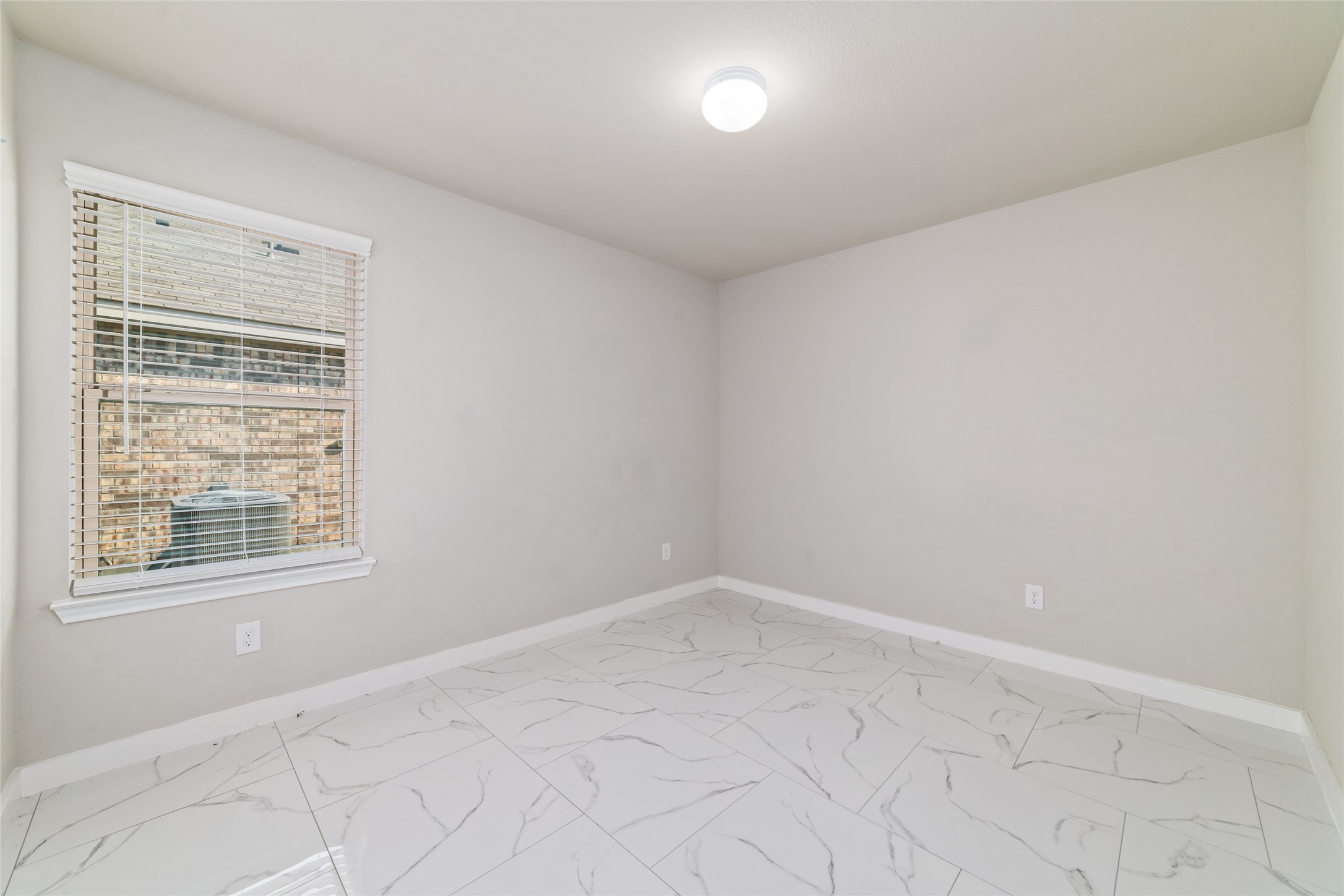 5502 Creekside Ridge Trail Katy, TX 77449 - Photo 6 of 25 an empty room with a window