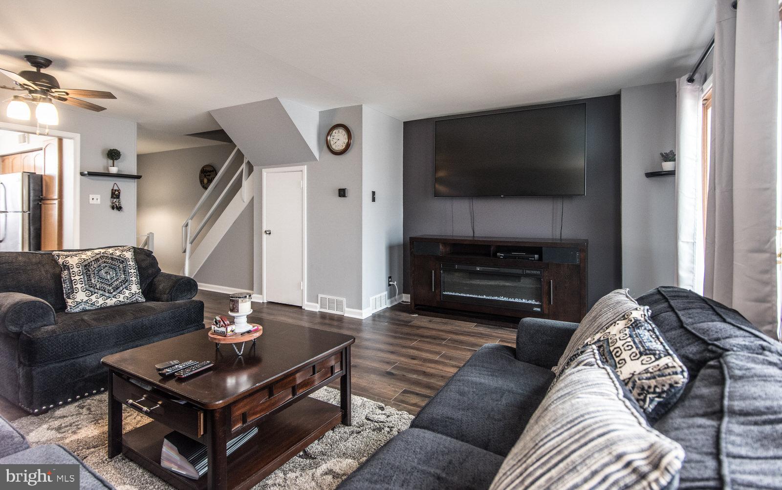 12138 Barbary Road Philadelphia, PA 19154 - Photo 11 of 71 a living room with furniture and a flat screen tv