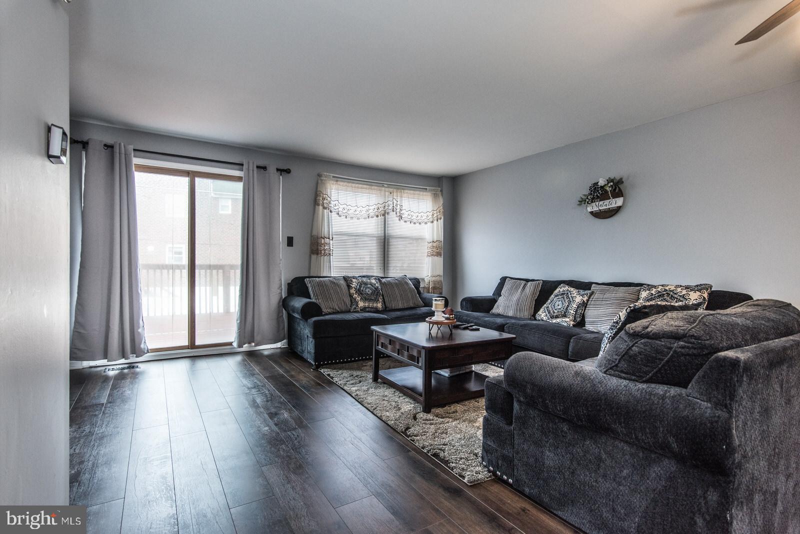 12138 Barbary Road Philadelphia, PA 19154 - Photo 15 of 71 a living room with furniture and a window