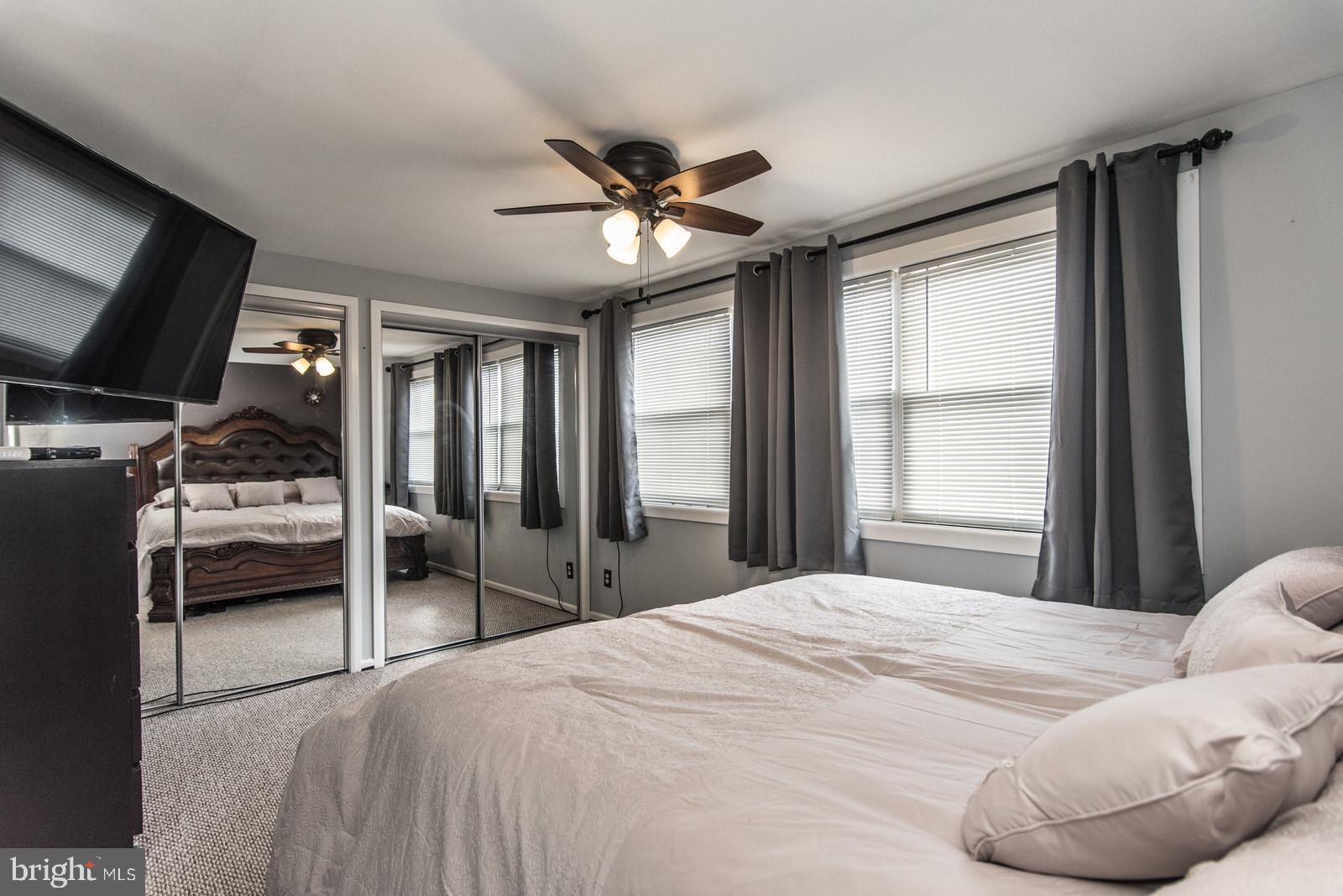 12138 Barbary Road Philadelphia, PA 19154 - Photo 25 of 71 a bedroom with a bed and a television