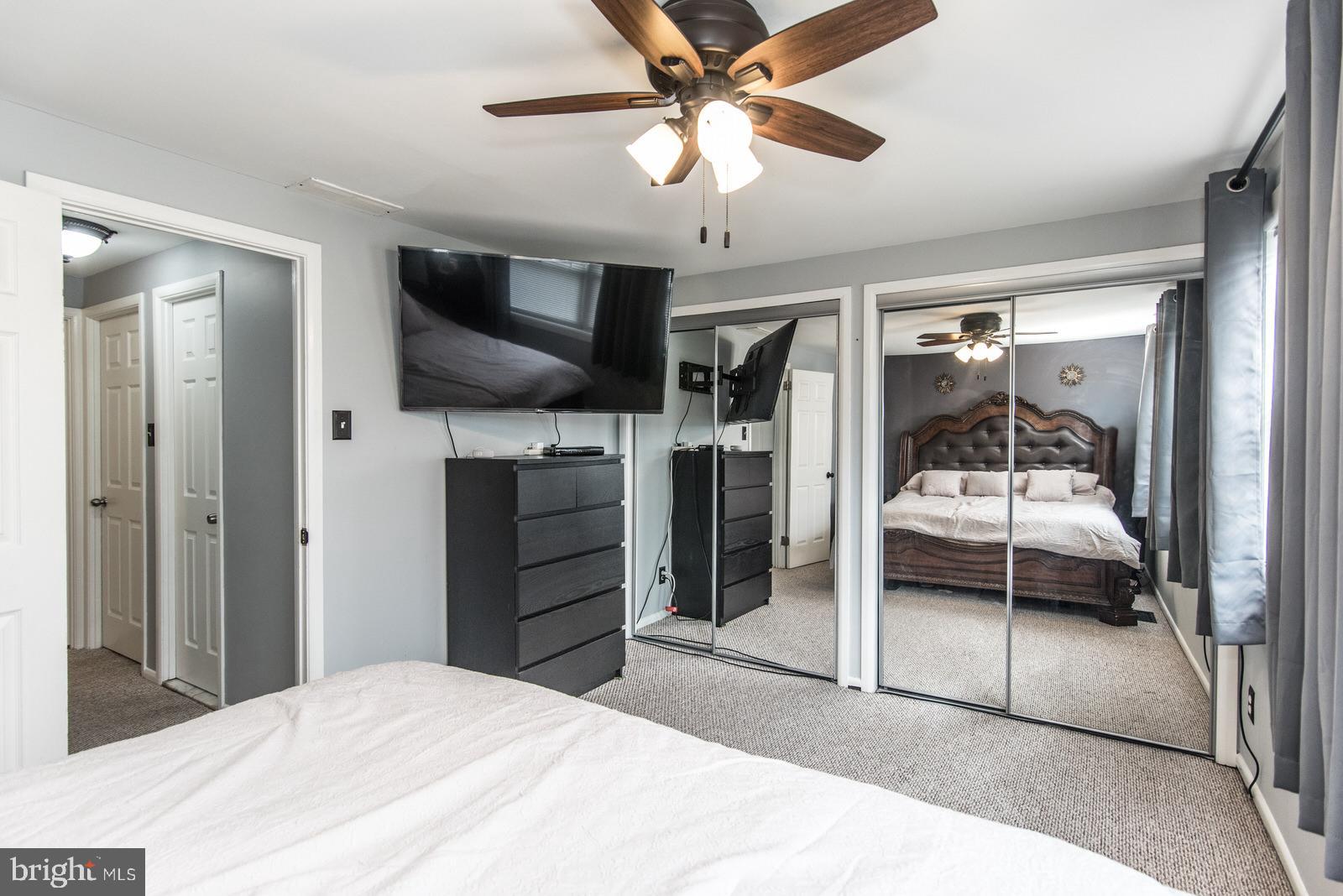 12138 Barbary Road Philadelphia, PA 19154 - Photo 26 of 71 a bedroom with a bed and a walk in closet