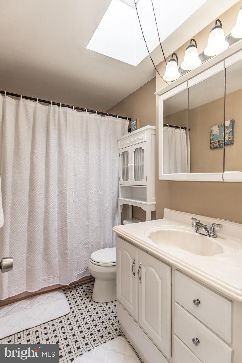 12138 Barbary Road Philadelphia, PA 19154 - Photo 35 of 71 a bathroom with a sink a toilet and shower