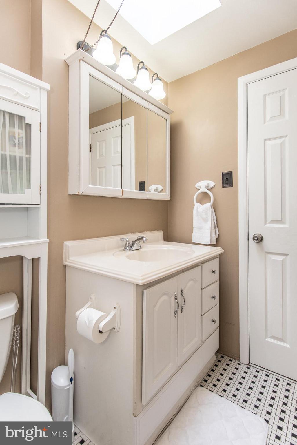 12138 Barbary Road Philadelphia, PA 19154 - Photo 36 of 71 a bathroom with a sink a toilet and mirror