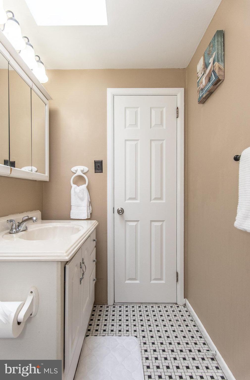 12138 Barbary Road Philadelphia, PA 19154 - Photo 37 of 71 a bathroom with a sink and a mirror