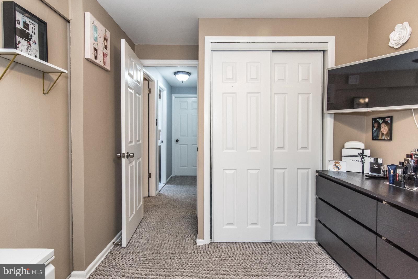 12138 Barbary Road Philadelphia, PA 19154 - Photo 44 of 71 a view of a hallway with closet and front door
