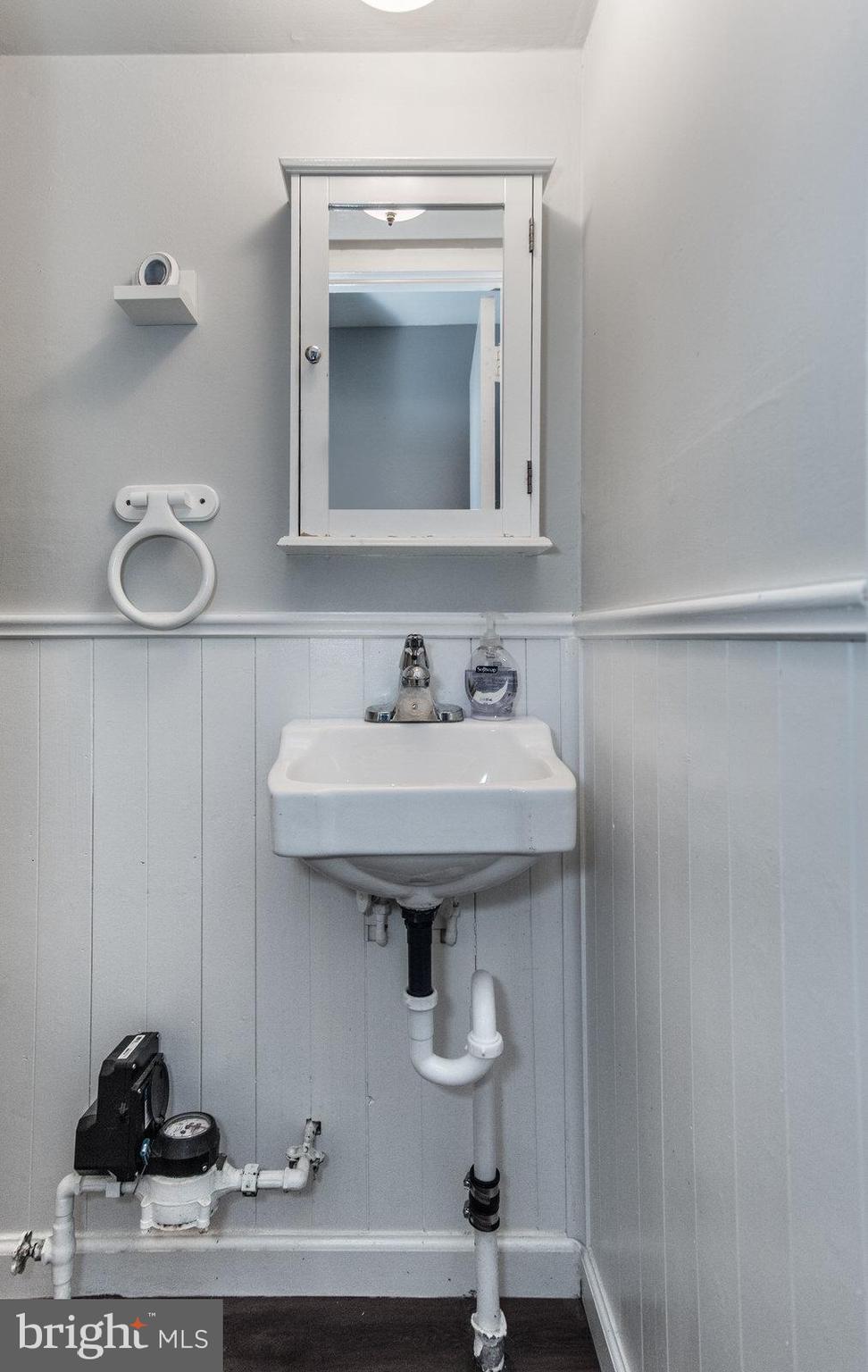 12138 Barbary Road Philadelphia, PA 19154 - Photo 46 of 71 a bathroom with a sink and a mirror