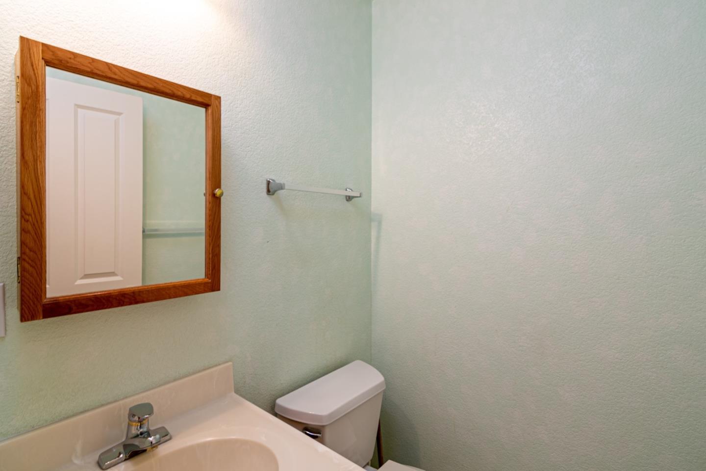 661 Cambrian Drive Campbell, CA 95008 - Photo 14 of 31 a bathroom with a sink and mirror with toilet