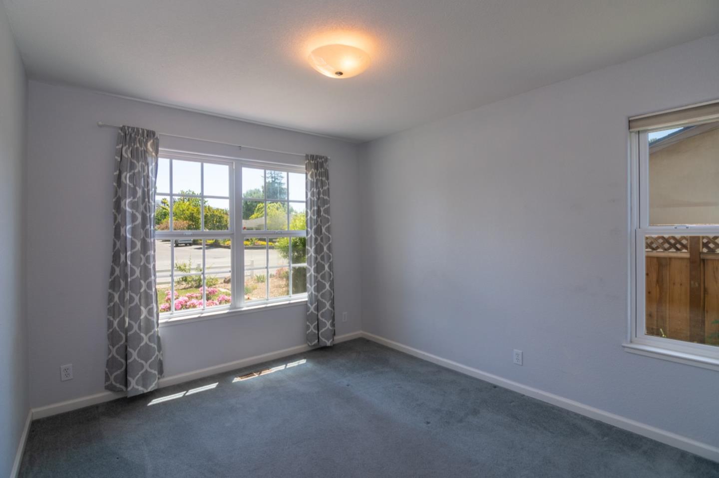 661 Cambrian Drive Campbell, CA 95008 - Photo 19 of 31 an empty room with windows