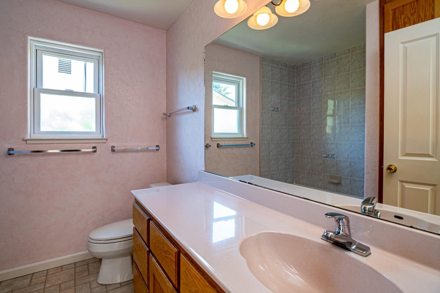 661 Cambrian Drive Campbell, CA 95008 - Photo 20 of 31 a bathroom with a sink a toilet and mirror
