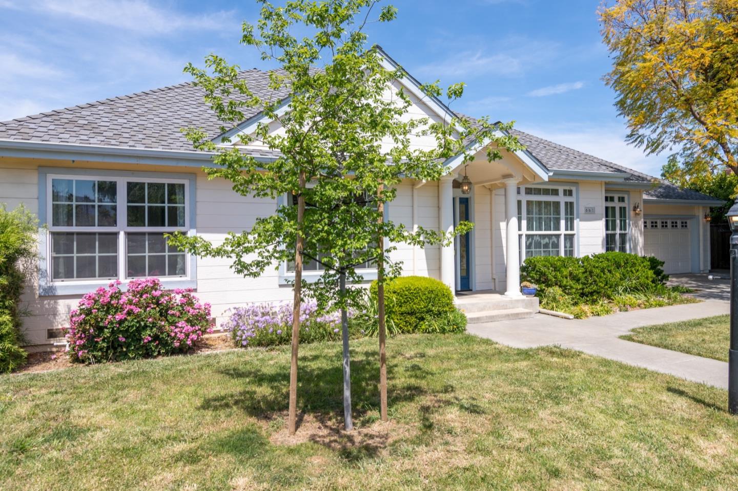 661 Cambrian Drive Campbell, CA 95008 - Photo 2 of 31 a front view of a house with a yard