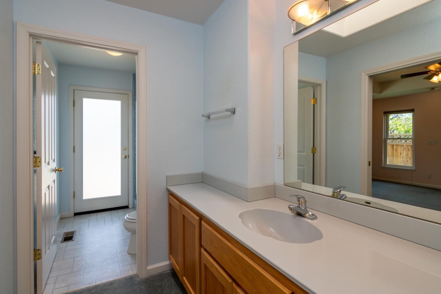 661 Cambrian Drive Campbell, CA 95008 - Photo 23 of 31 a bathroom with a sink and a mirror