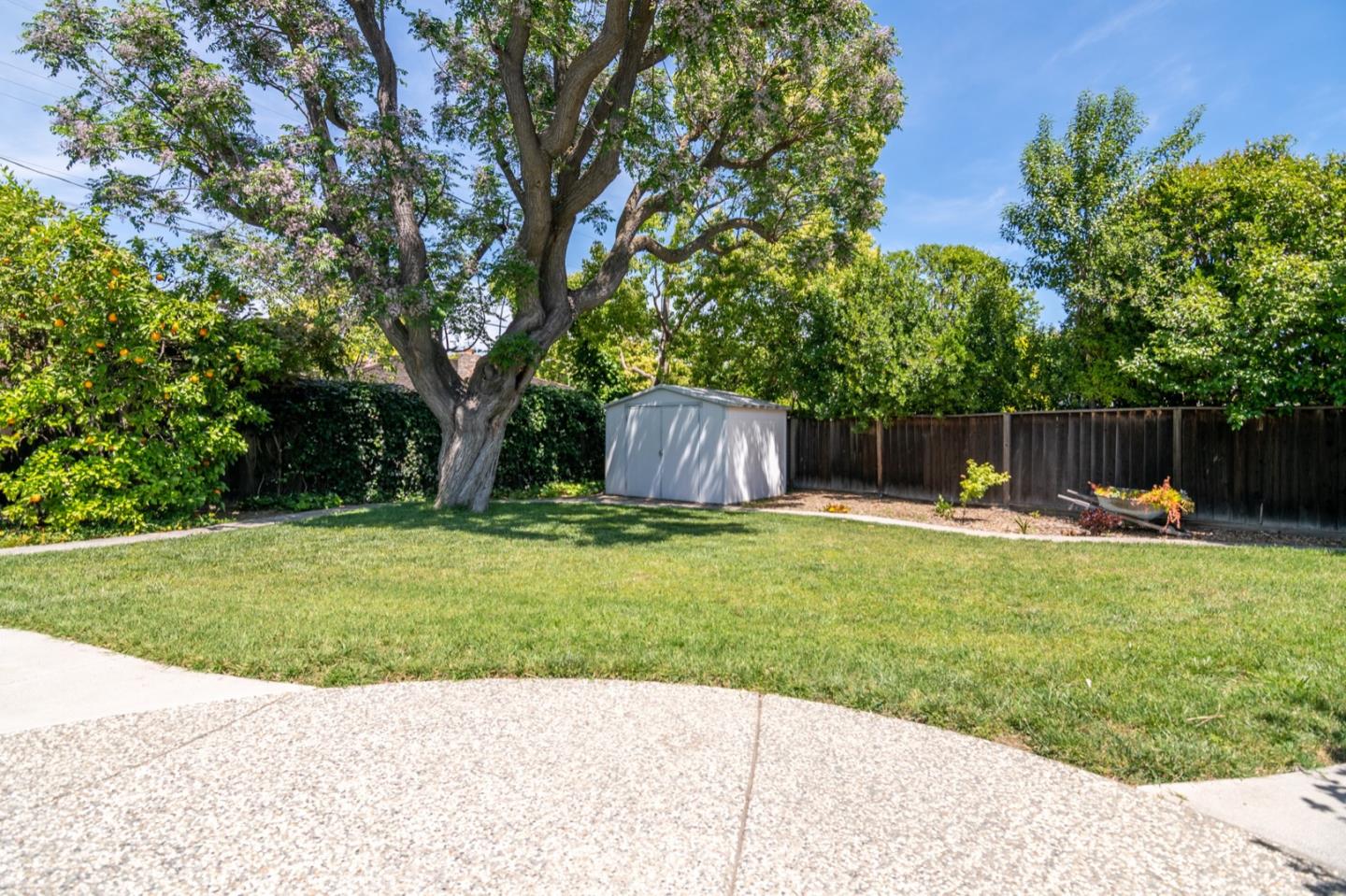 661 Cambrian Drive Campbell, CA 95008 - Photo 30 of 31 a swimming pool with outdoor seating and yard