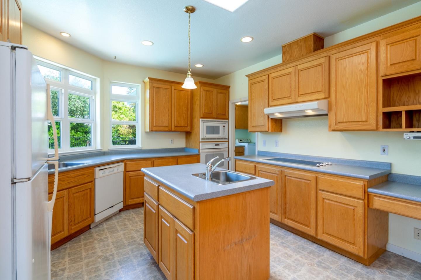 661 Cambrian Drive Campbell, CA 95008 - Photo 9 of 31 a kitchen with stainless steel appliances granite countertop a sink stove and cabinets